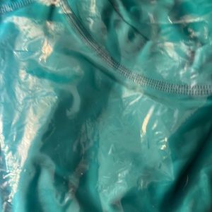 Swim shirt by Sporting with SPF 50.